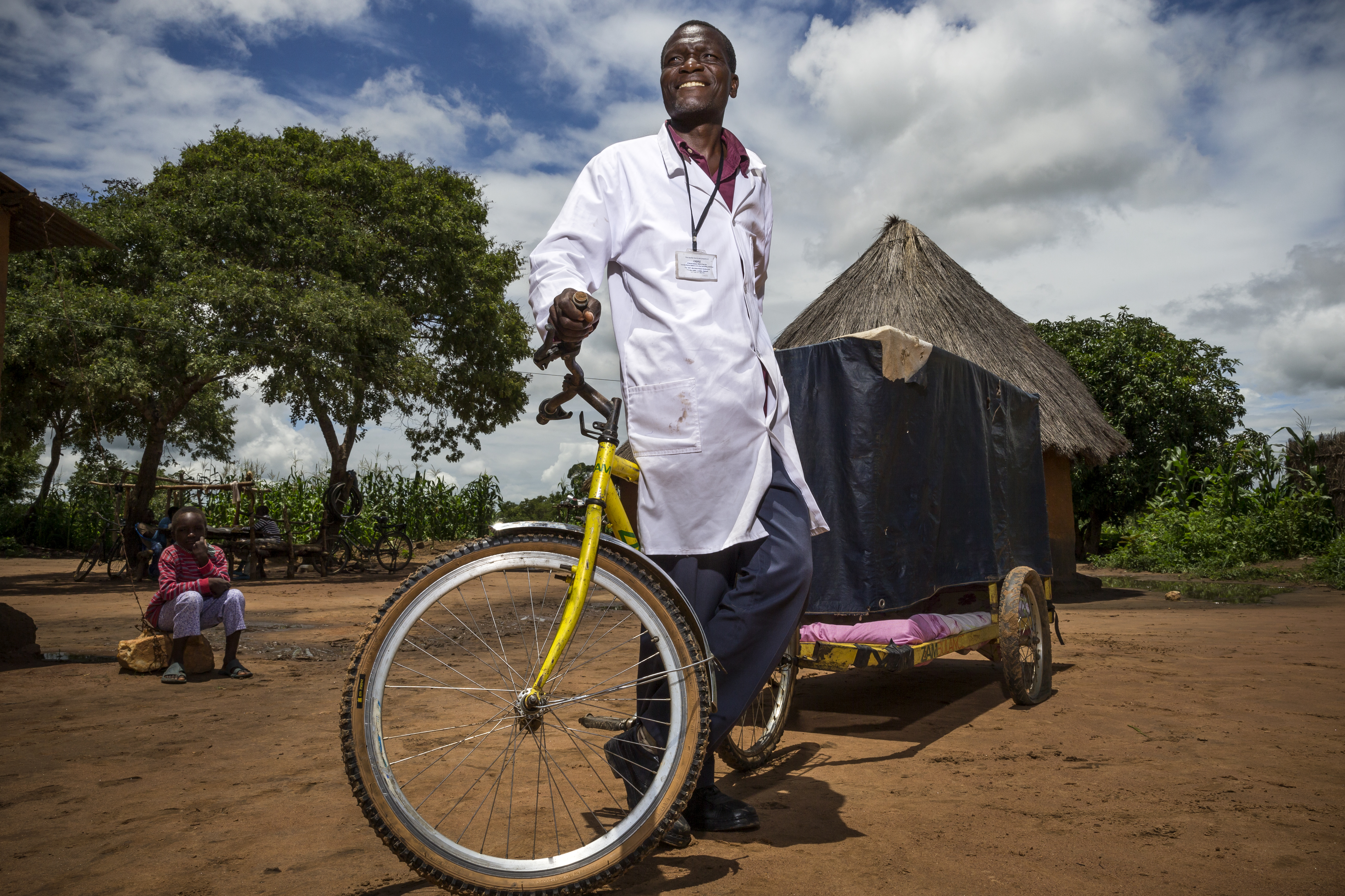 Tricycle with a house-shaped cart in a rural setting