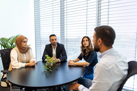 Colleagues having a discussion at work