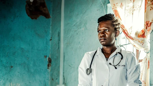 A female doctor looking in the distance