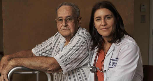 HCP with a patient on a walker